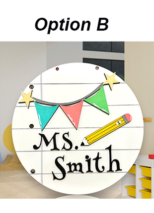 A round wooden door hanger for Teachers. It features a noteback paper-inspired background, and has a flag pendant with colorful flags and stars on each end. There is also a pencil cutout on the door hanger, and the name Ms Smith. 